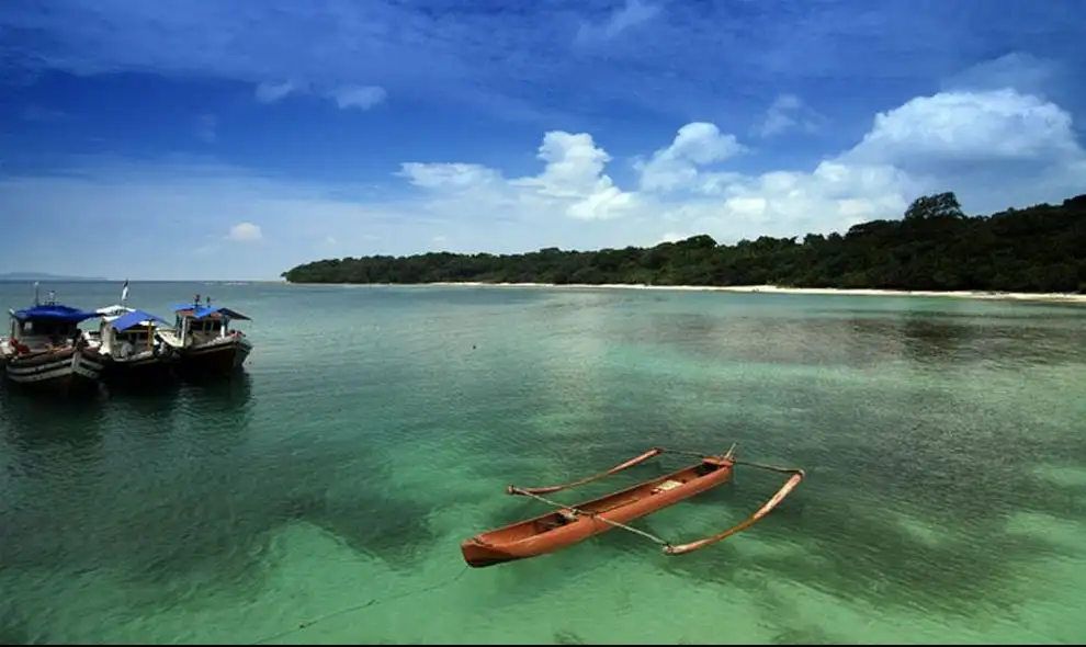 Boat and canoe at Panaitan Island Boat and canoe at Panaitan Island